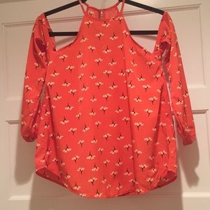 Melon colored blouse with floral patter